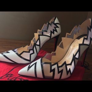 Christian Louboutin Explotek 100 sky high pumps.